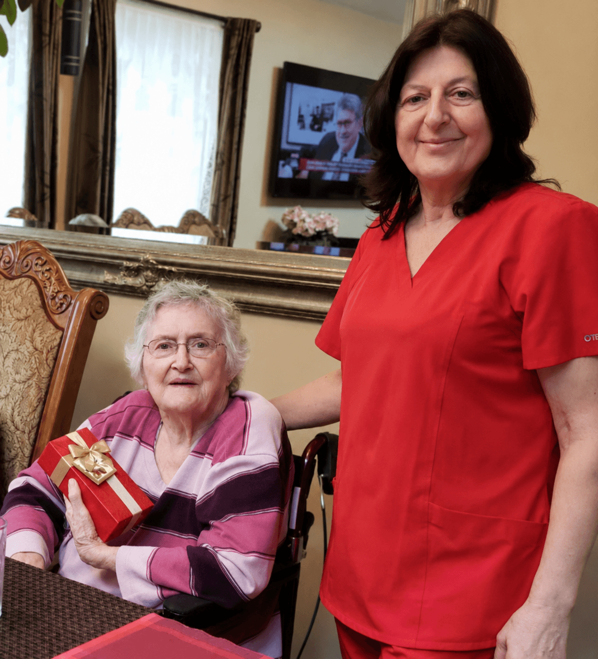 Caregiver with resident at The Oaks at Garfield senior care Carmichael CA