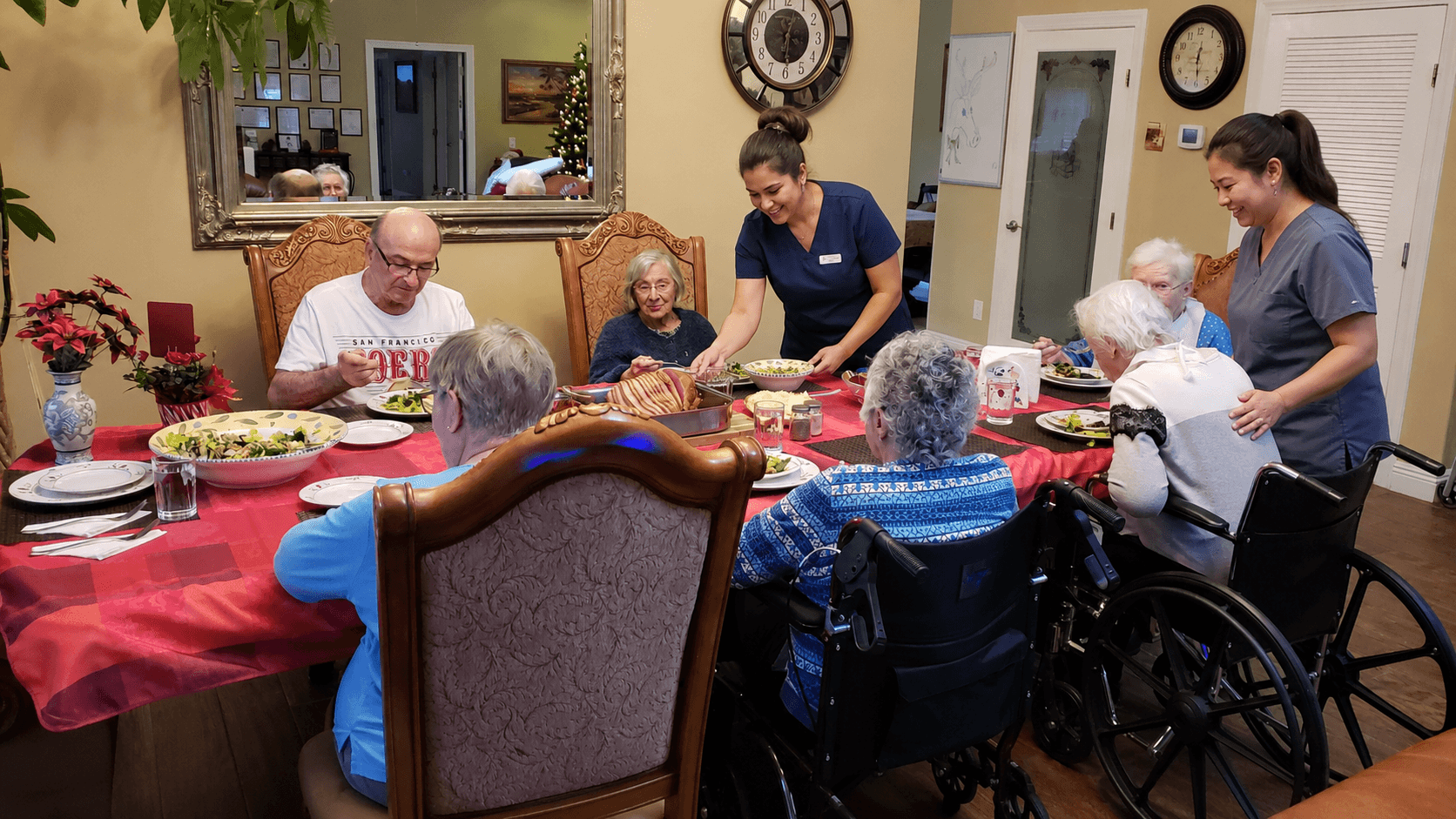 Caregiver assisting resident at The Oaks at Garfield assisted living Carmichael CA