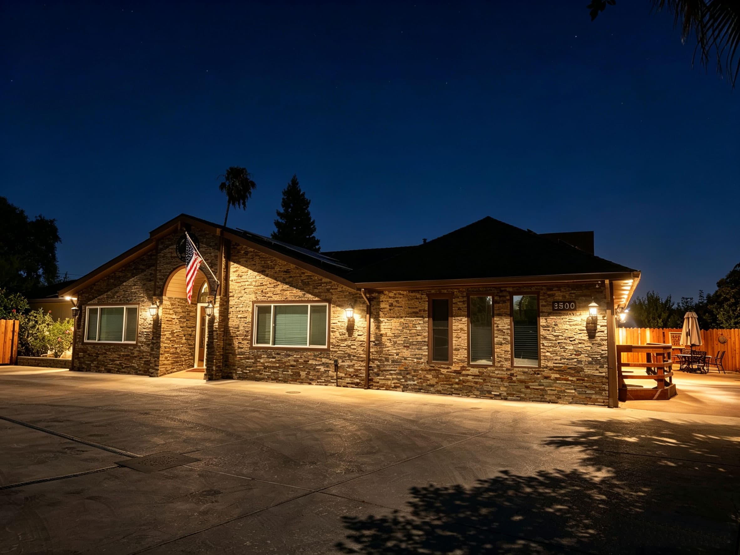 The Oaks at Garfield assisted living facility exterior at night in Carmichael CA